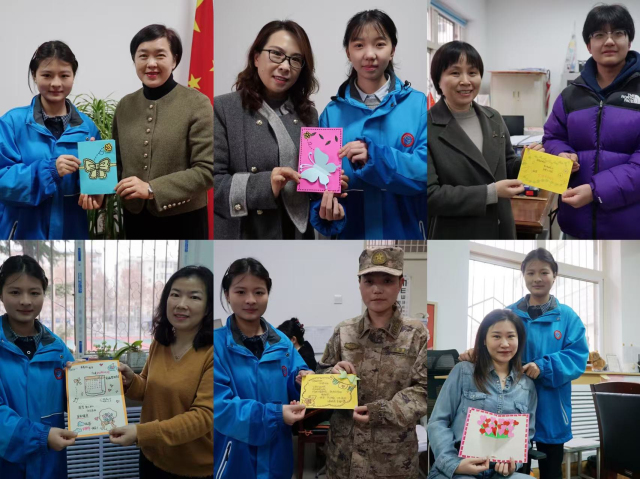1741317806807476.jpg 学生代表向女教职工送上节日贺卡.jpg